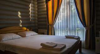 Гостиница Eco Park Hotel Шахты Улучшенный двухместный номер с 2 отдельными кроватями и видом на сад-14