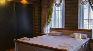 Гостиница Eco Park Hotel Шахты Номер с кроватью размера "queen-size" и видом на сад-9
